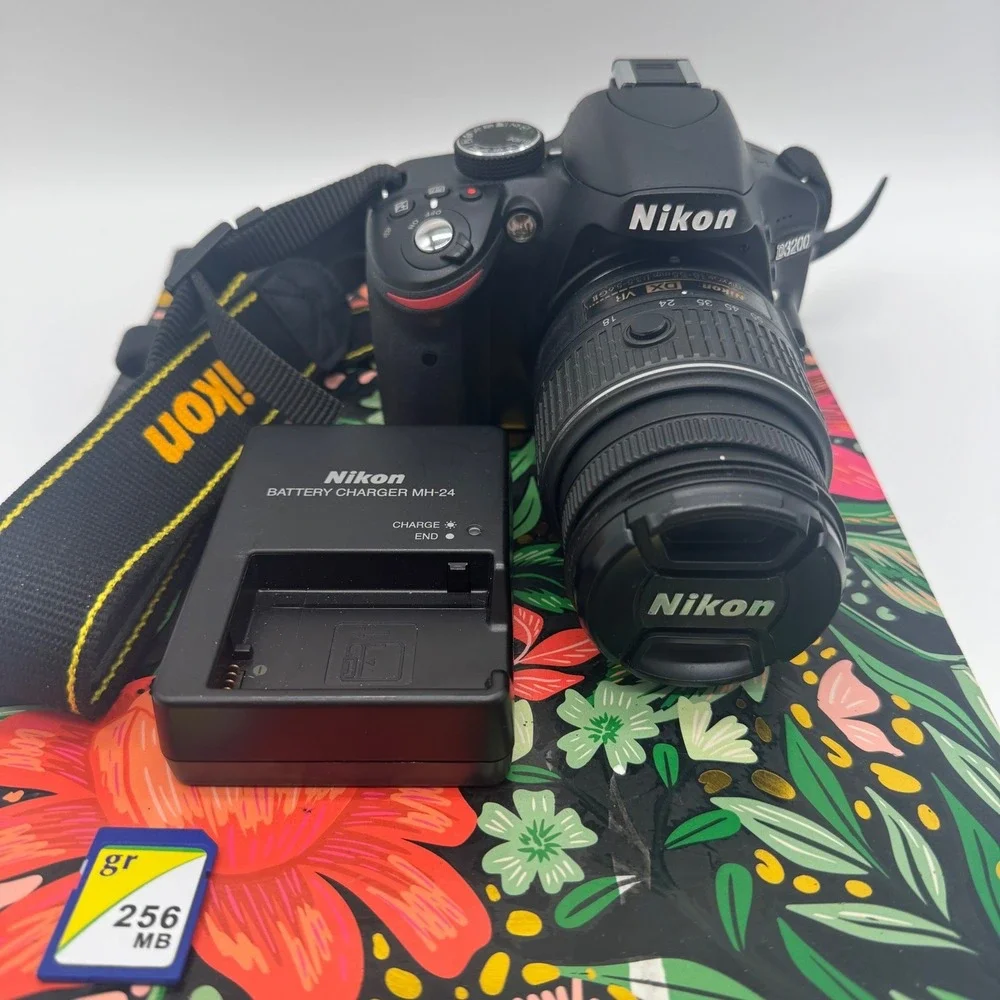 Nikon D3200 Digital SLR Camera Black with 18-55mm VR II Lens and Charger Bundle